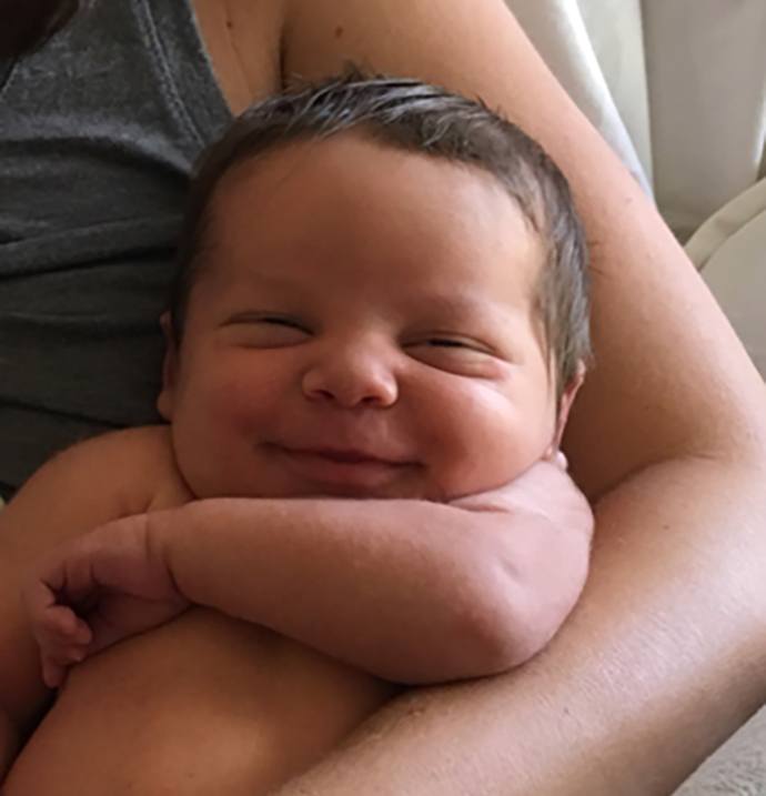 Maria's baby smiling
